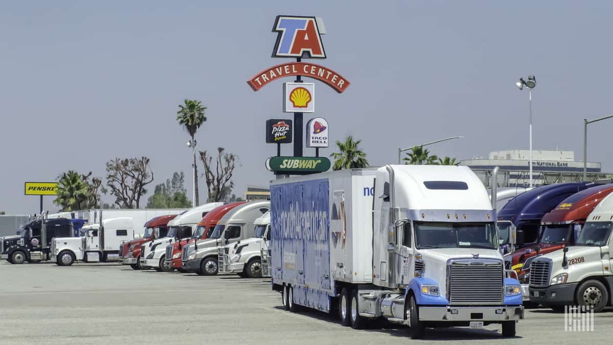 Truck moving through TA travel center parking lot