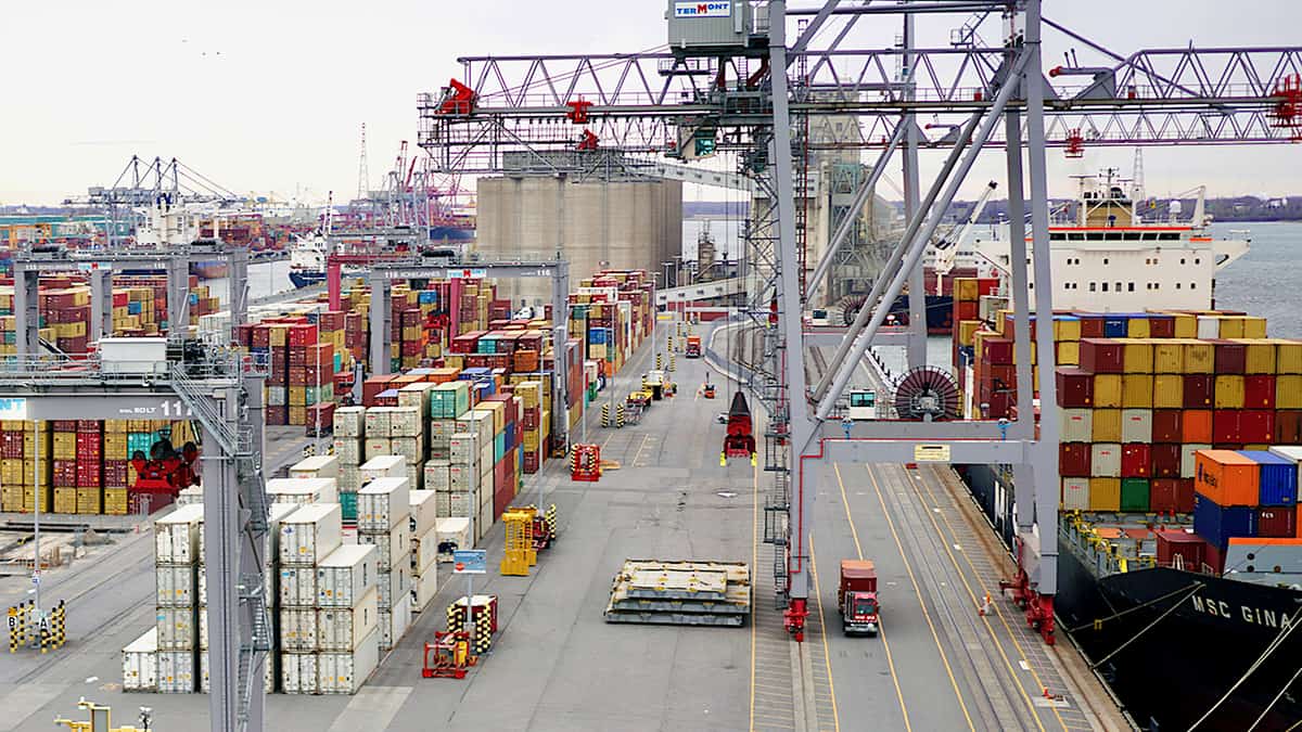 An aerial view of trucks moving through a Port of Montreal container terminal. Longshore workers plan to strike on Monday.