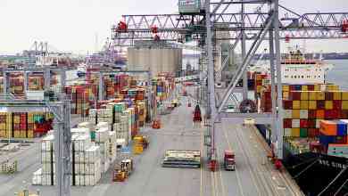 An aerial view of trucks moving through a Port of Montreal container terminal. Longshore workers plan to strike on Monday.