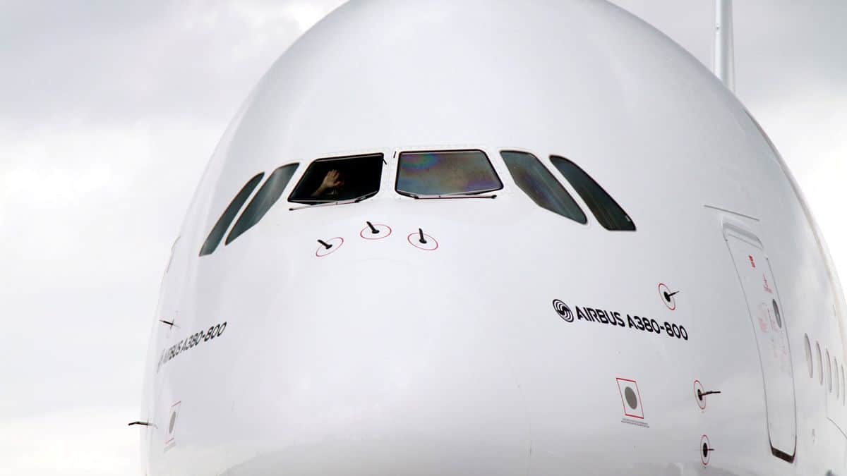 Cockpit close-up of white A380 jumbo jet.