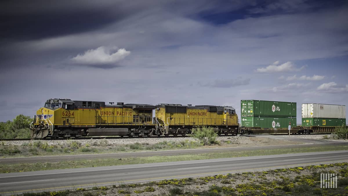 A photograph of a Union Pacific train pulling double stacked intermodal containers.