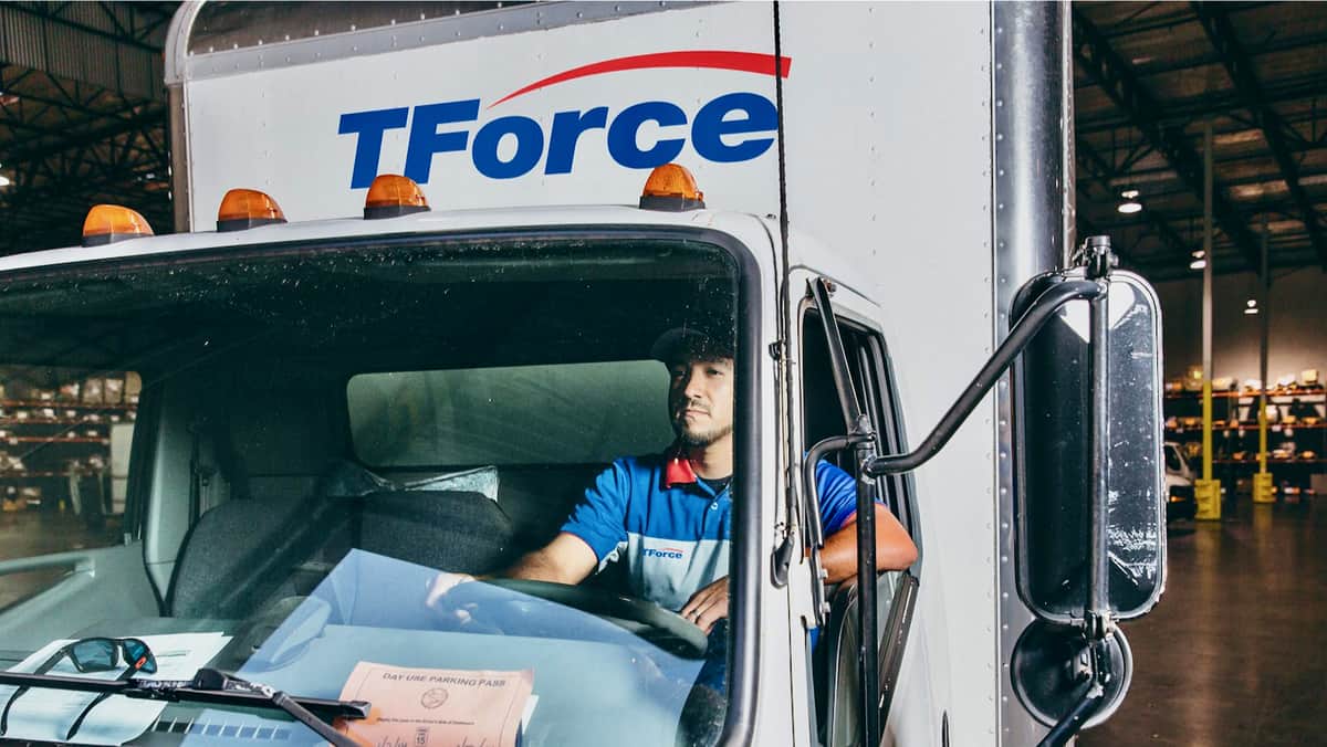 A straight truck of TForce Logistics, a TFI International subsidiary. TFI is acquiring DLS Worldwide in a major expansion of its U.S. logistics business.