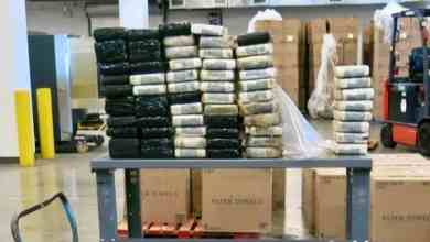 Packages of suspected cocaine seized by Canada Border Services Agency officers from a truck crossing from the United States. The truck driver was arrested.