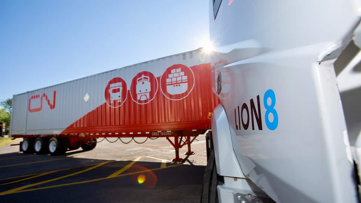 A Lion8 truck attached to a CN intermodal container.