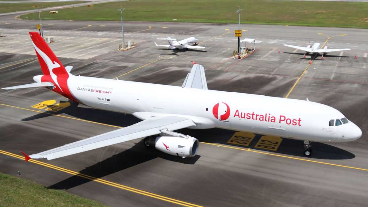 A white jet with red tail, Australia Post livery.