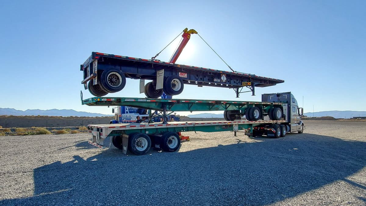 Flatbed trailers loaded on Daseke rig