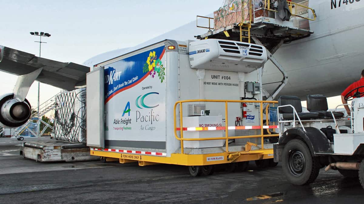 A refrigerated container ready to be loaded on a plane.