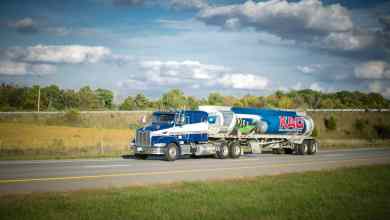 A truck of Kanan Advantage Group (KAG) travels on a road. The owner is reportedly considering selling KAG.