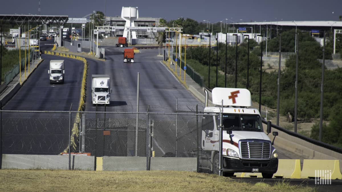 A view of trucks crossing the U.S.-Mexico border. Texas customs broker Daniel B. Hastings was recently targeted by ransomware hackers.