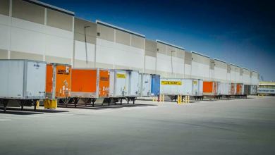 Trucks parked at a warehouse