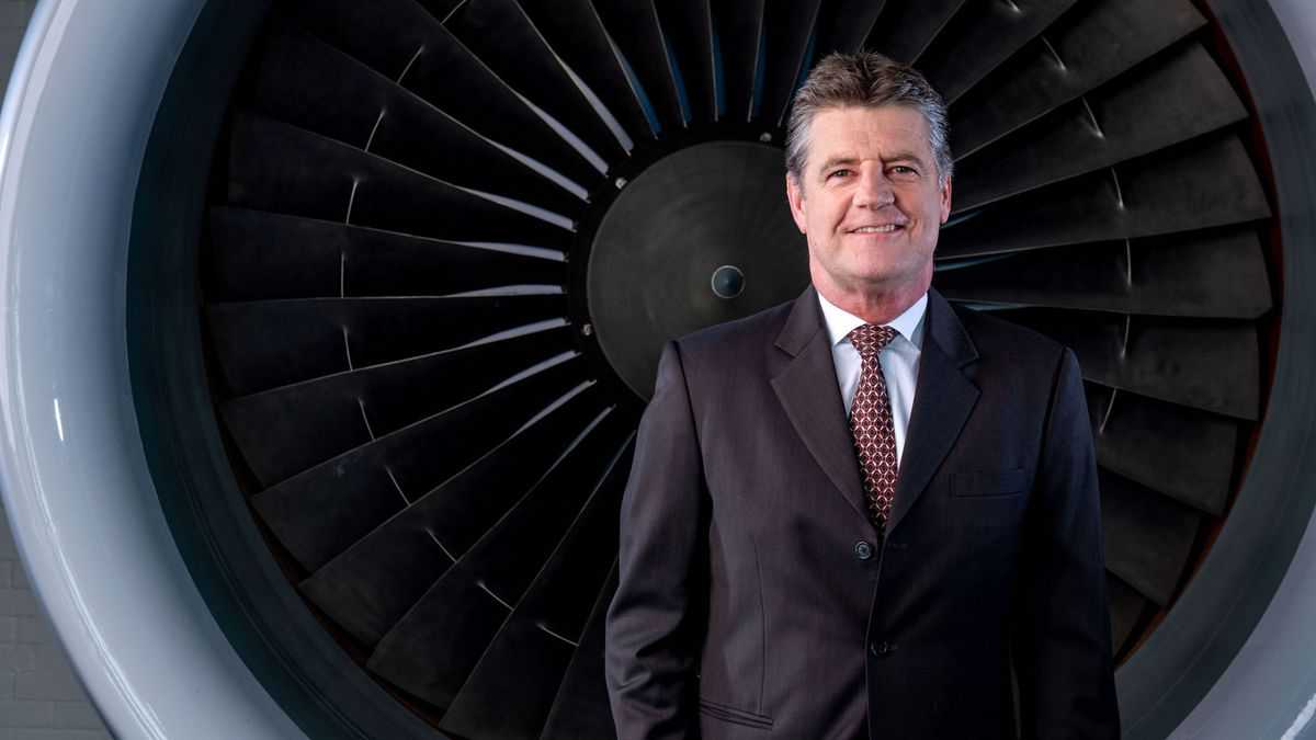 Robert Walpole, Delta Air Lines' new vp of cargo, stands before a jet engine in this profile.