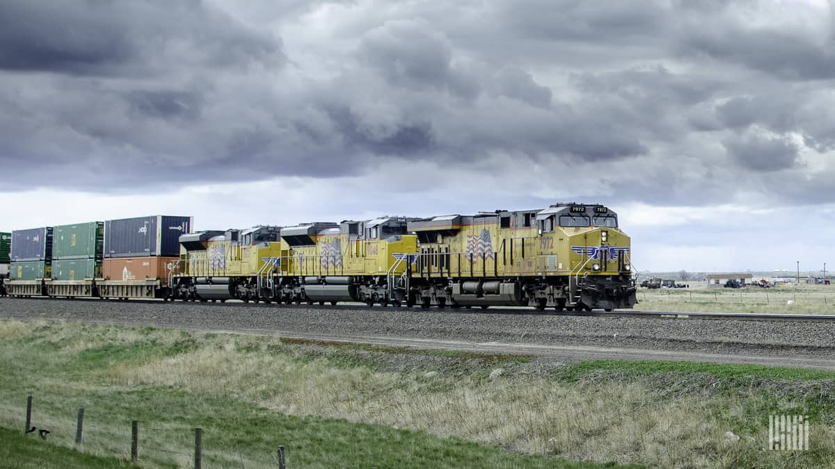 A photograph of a Union Pacific train hauling intermodal containers.