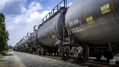 A photograph of a train of tank cars.