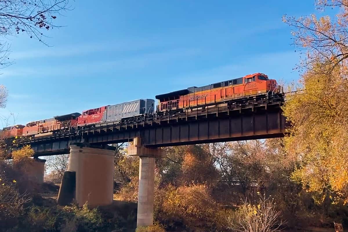 A photograph of a BNSF train crossing a bridge.