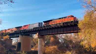 A photograph of a BNSF train crossing a bridge.