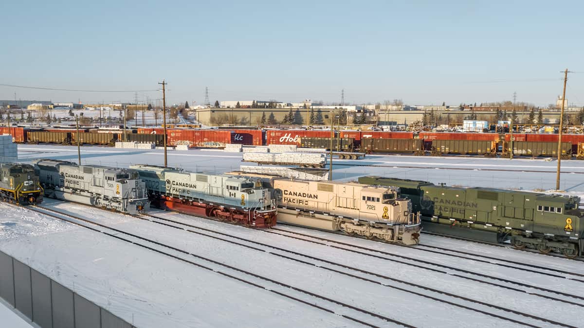 A photograph of a Canadian Pacific train at a rail yard.