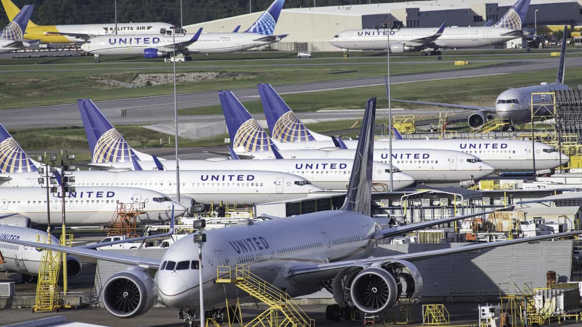 United Airlines planes parked at airport.