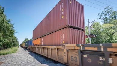 A photograph of a train hauling intermodal containers.