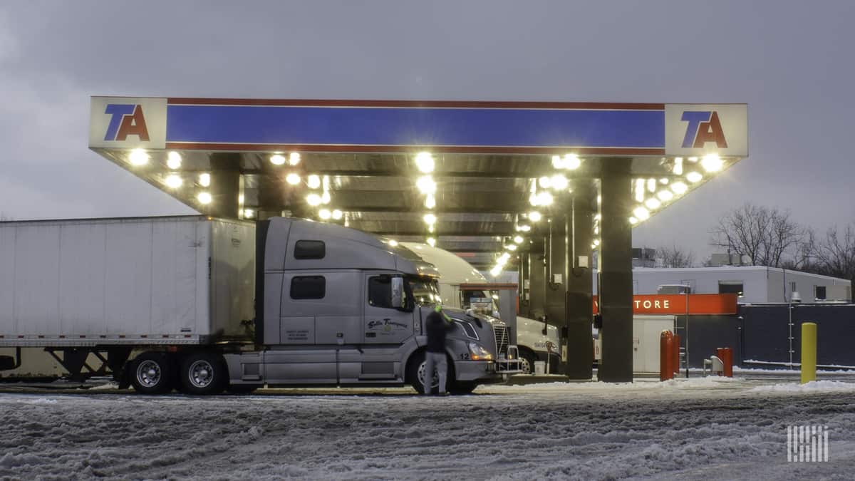 Driver pulled into a truck stop on a snow day.