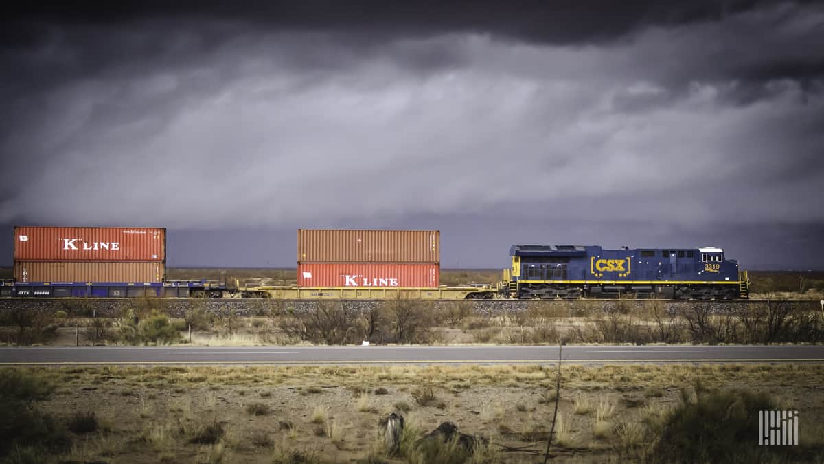 A photograph of a CSX train hauling intermodal containers.