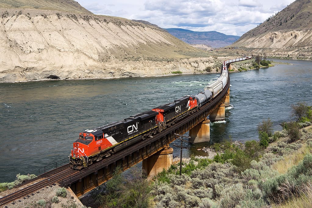 A photograph of a CN train crossing a bridge.