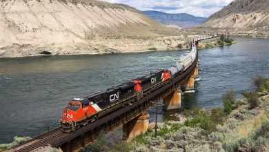 A photograph of a CN train crossing a bridge.