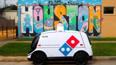 Nuro R2 self-driving robot delivering Domino's pizza in Houston