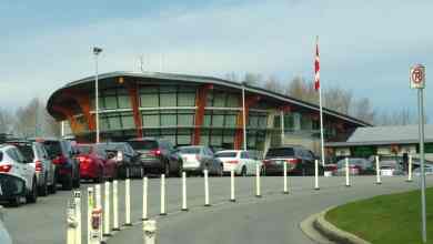 A view of cars lining of at the Watson US-Canada border crossing to illustrate an article about a trucker arrested on drug charges at that border crossing.