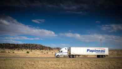A tractor-trailer of TFI International carrier Papineau.