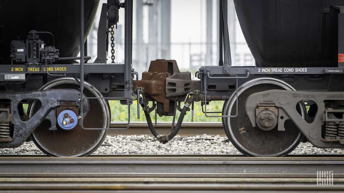A photograph of freight railcar wheels.