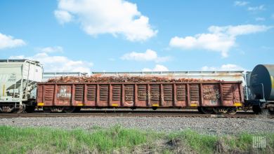 A photograph of railcars on train track.