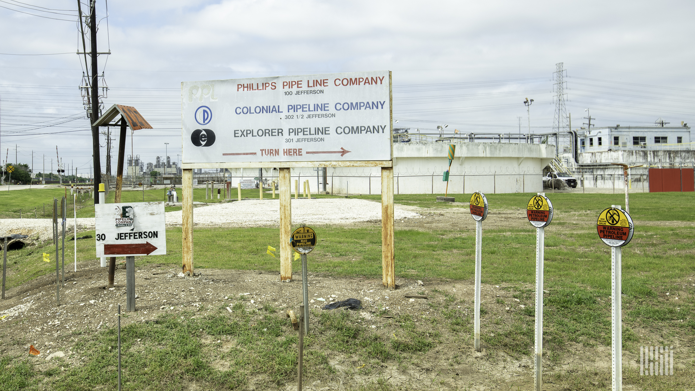 A sign pointing to Colonial Pipeline, which was targeted in a ransomware attack.