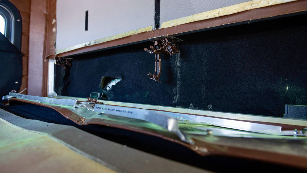 A photo of a secret compartment in the cabs of a semi truck used to stash cocaine and meth as part of a smuggling ring that transported drugs to Canada.