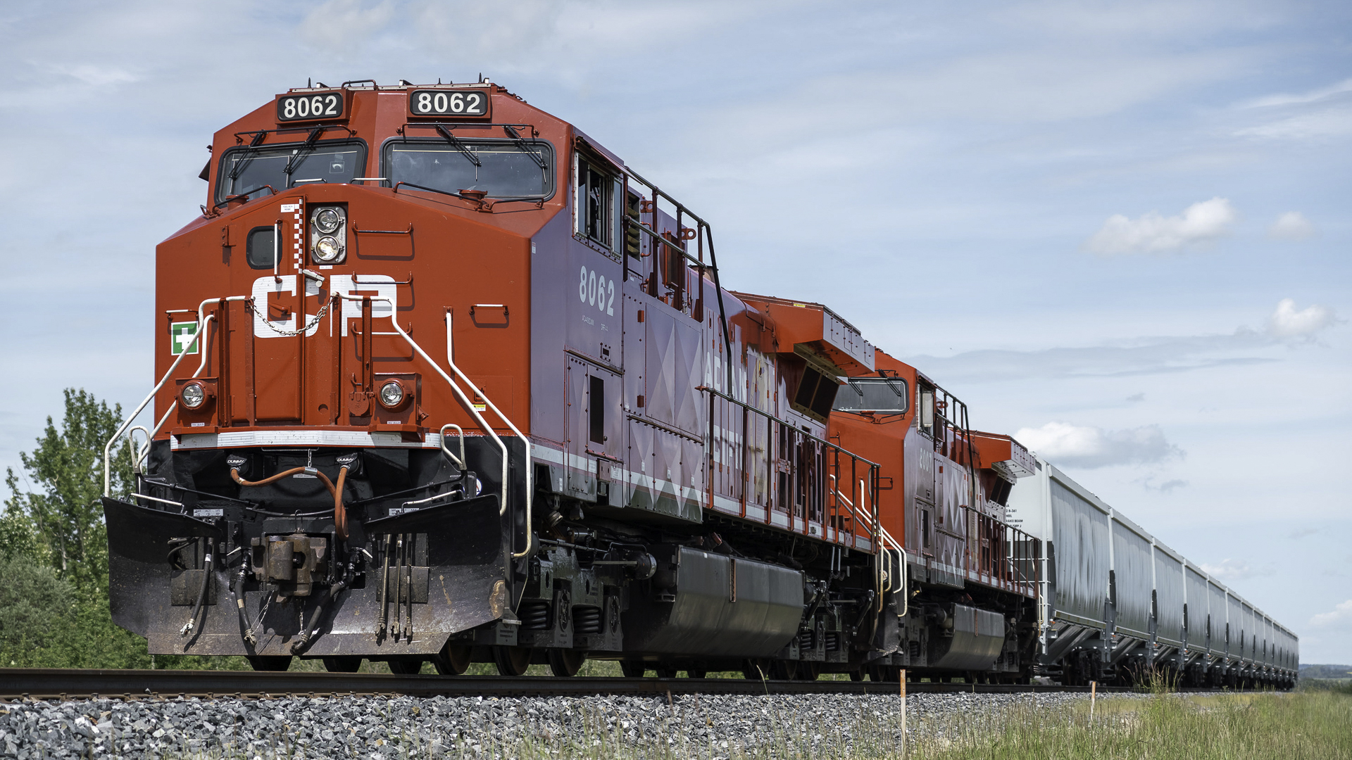 A photograph of a Canadian Pacific train on a train track.