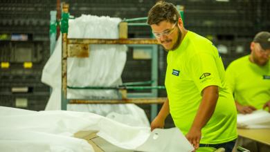 A Pro TEC-USA employee makes medical gowns in Michigan. (Photo: Pro TEC-USA)