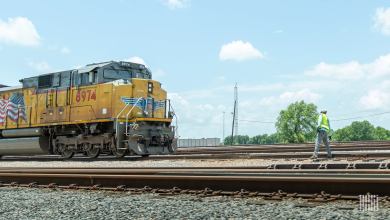 A photograph of a Union Pacific train on a train track.