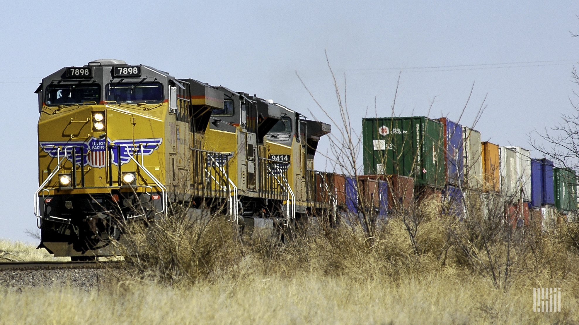 A photograph of a Union Pacific train hauling intermodal containers.