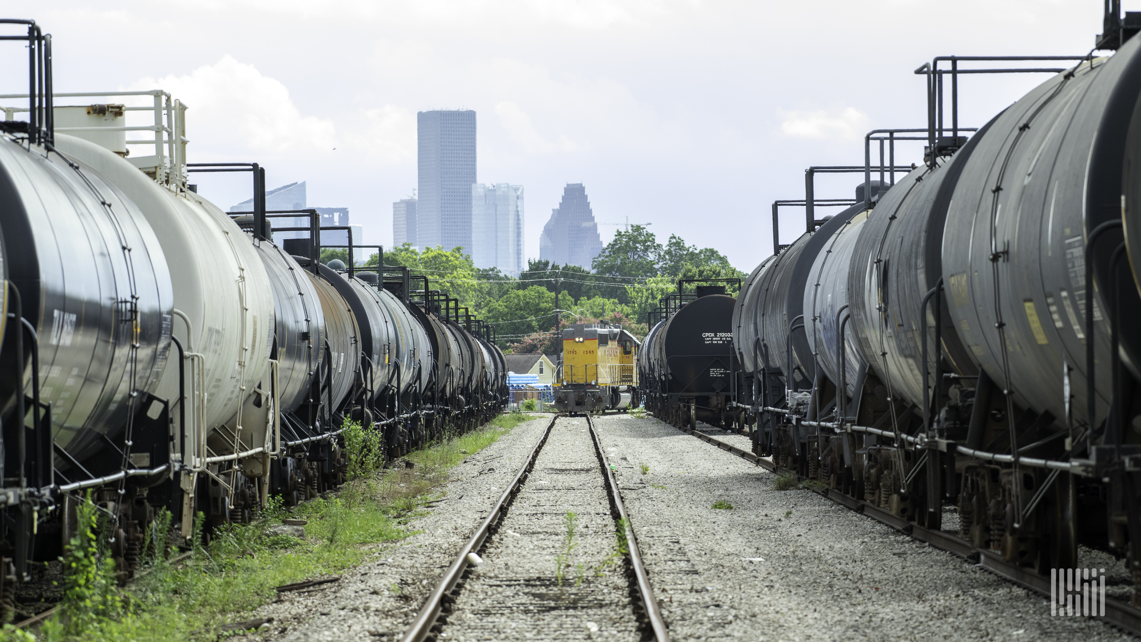 A photograph of a Union Pacific train at a rail yard.