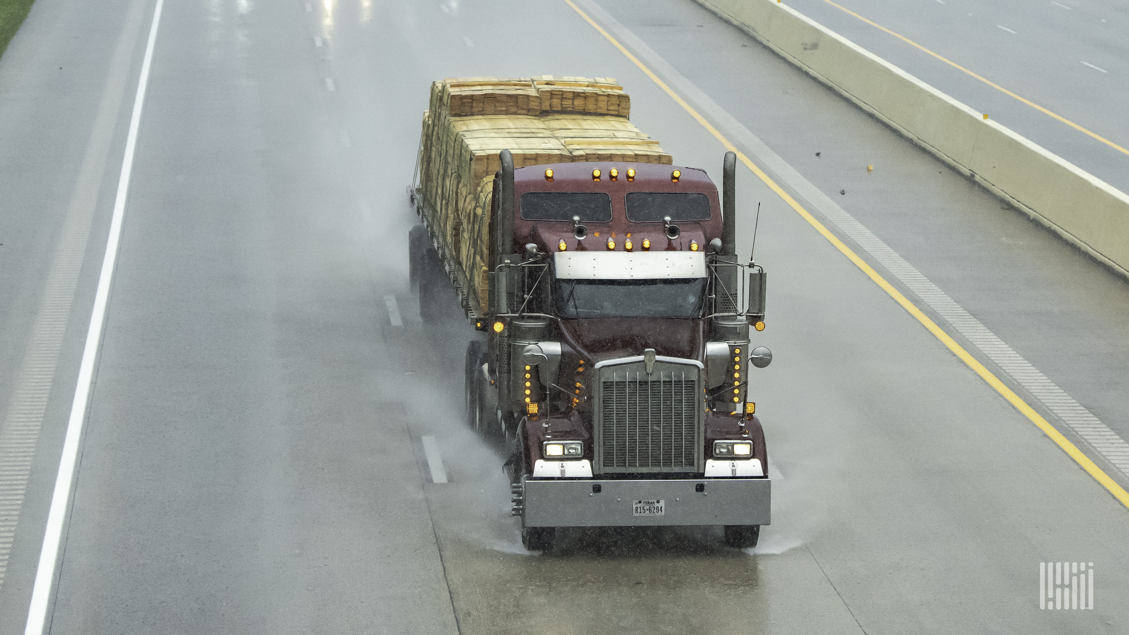 Tractor-trailer in heavy rain.