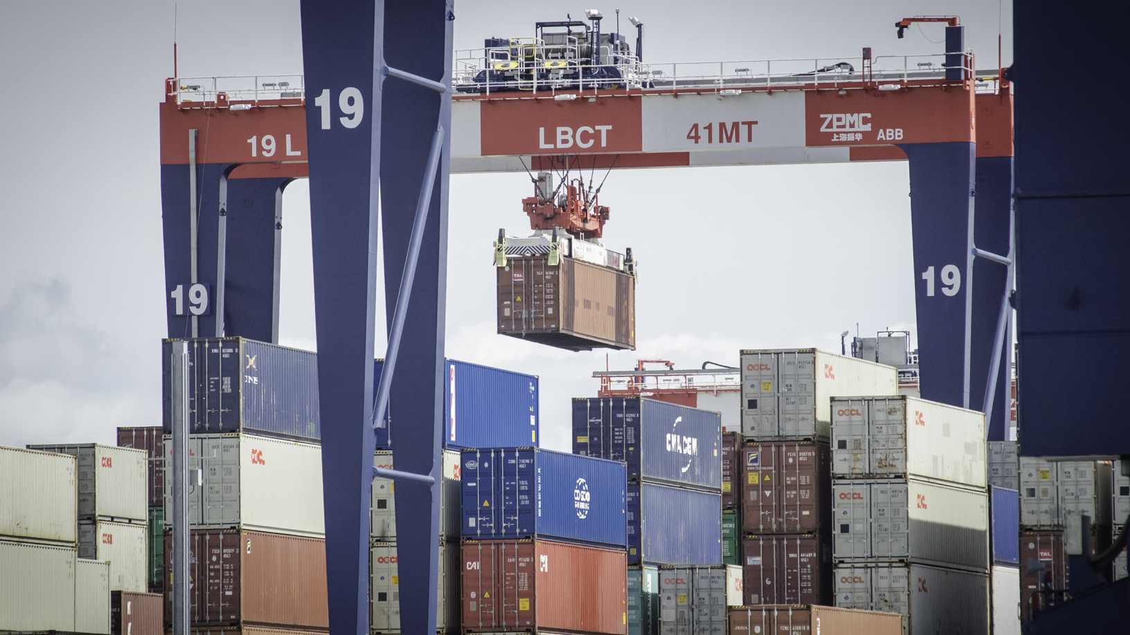 Rail-mounted gantry cranes cull container stacks at the Port of Long Beach.