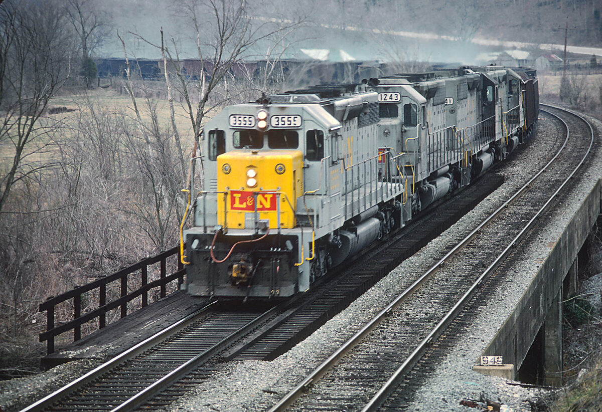 Coal was one of the Louisville and Nashville's primary commodities. Here, L&N diesel locomotives lead a long string of coal hoppers in February 1980. (Photo: Roger Puta/American-Rails.com)