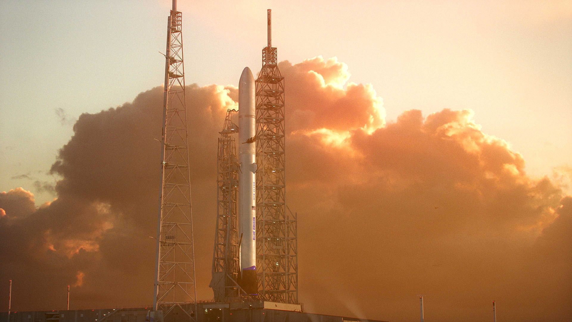 A large rocket lifts off spewing huge cloud of exhaust filtering the sun