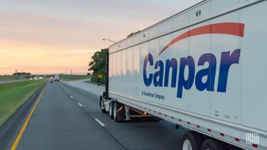 A truck pulling a trailer of Canadian trucking firm TFI International company Canpar in the United States.