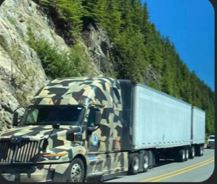 A camouflaged version of the Western Star 57X captured in highway testing.