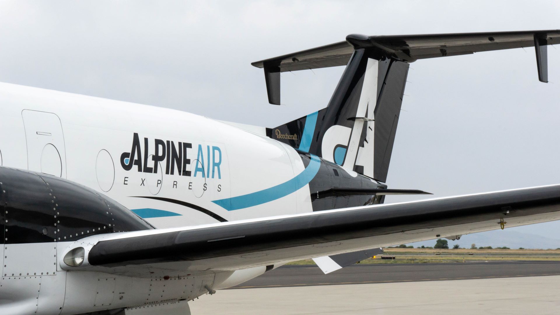 An Alpine Air Express cargo jet, view of rear. Alpine Air is expanding through an acquisition.