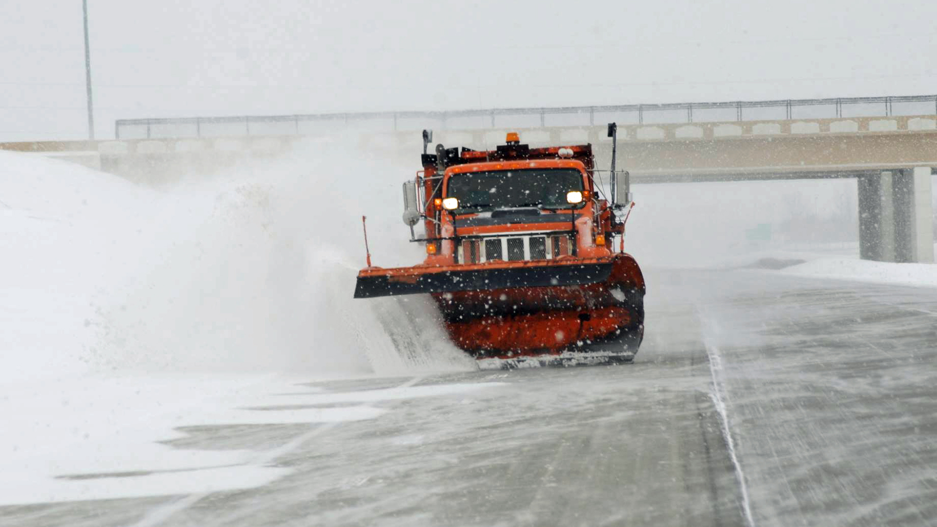 Snow plow clearing a North Dakota highway.