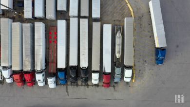 Aerial view of parked trucks.