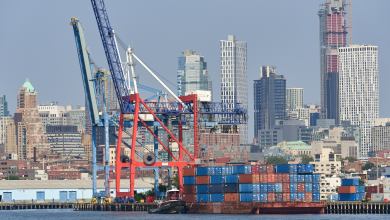 A view of a containership seen from across the water at the Port of New Jersey and New York