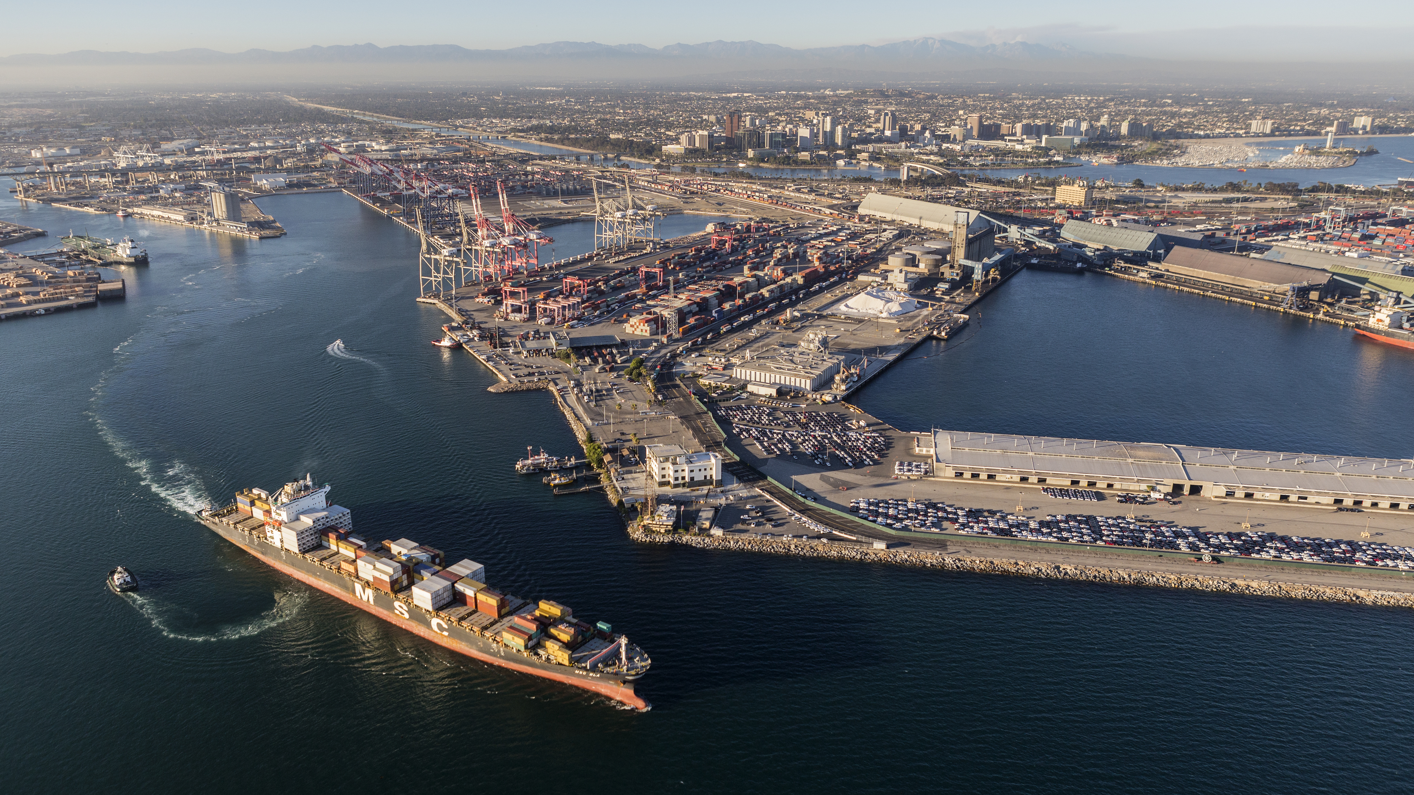 An aerial view of a port near a body of water.