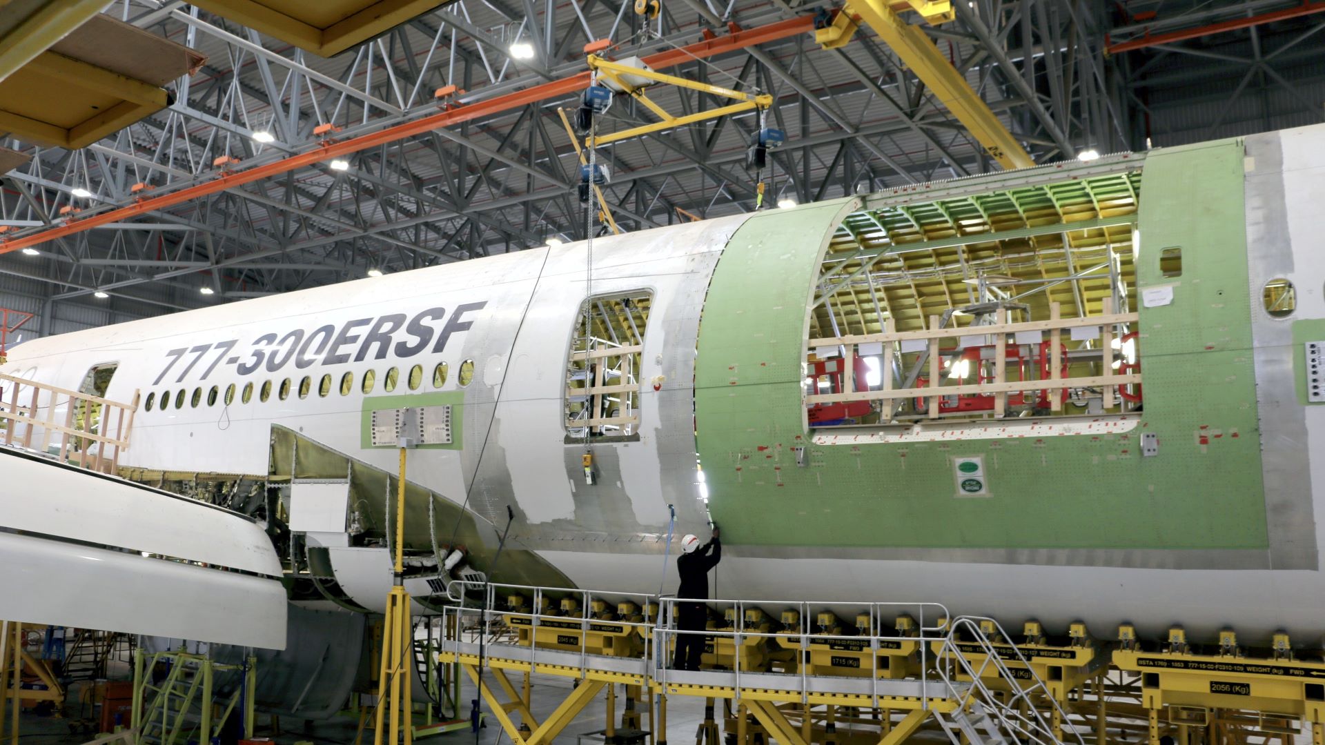 Fuselage of an aircraft in a production hanger.